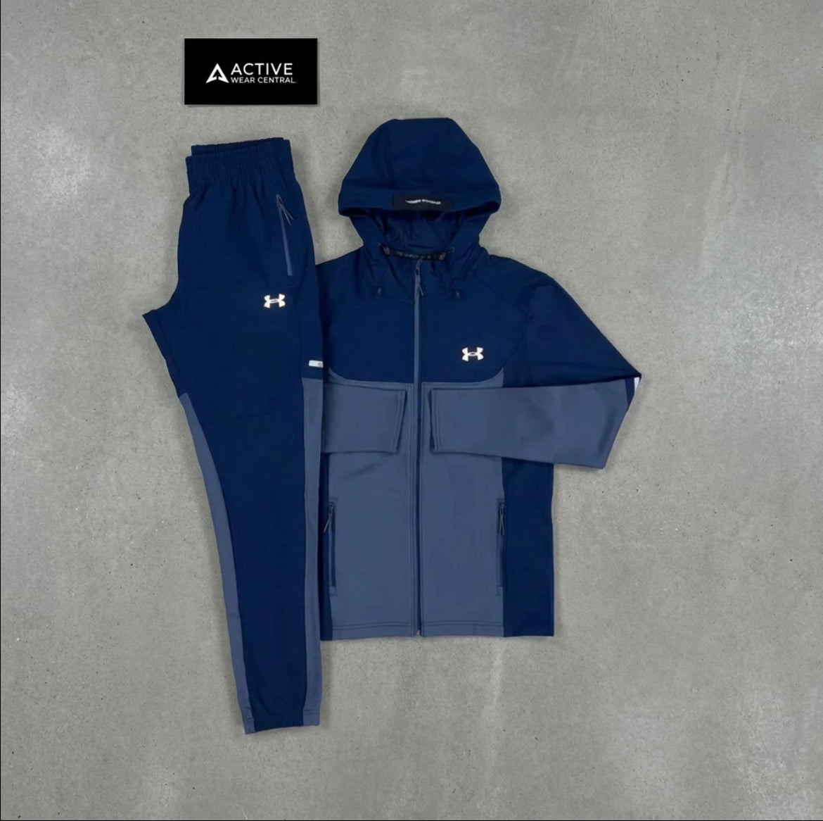 Under armour winterized track suit-blue